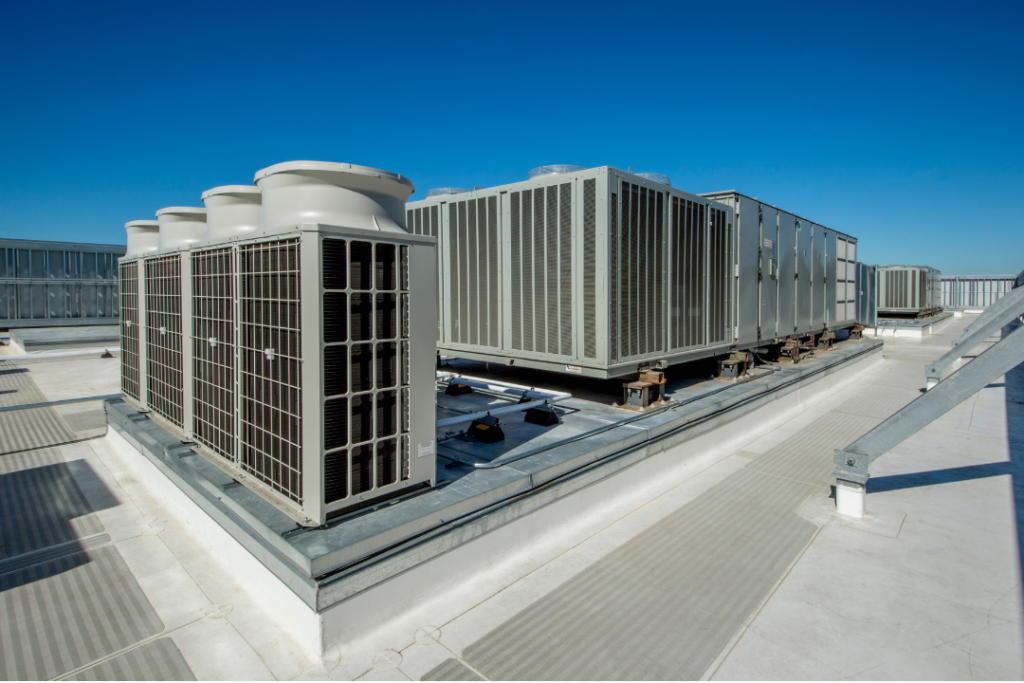 Large rooftop commercial HVAC units installed for efficient heating and cooling in a commercial building