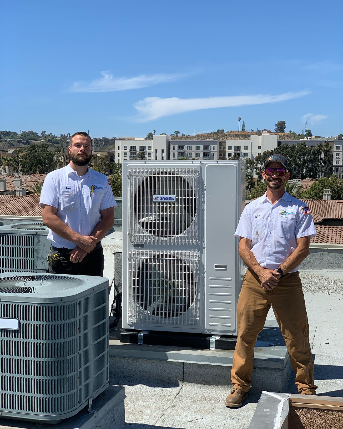 Commercial Hvac Worker completing an installation in Mission Valley, Ca with this Installation the happy home owner gets a 2 year Maintenance